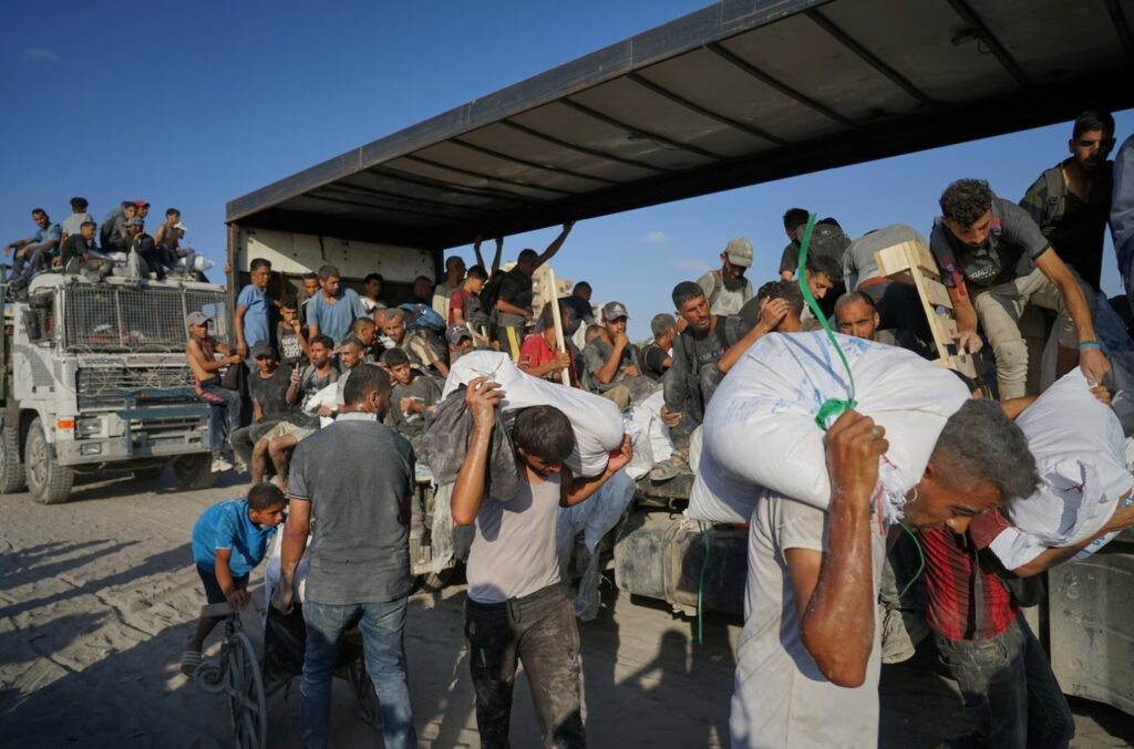 Looting, Chaos, and Israeli Gunfire Prevent Aid from Reaching Gaza